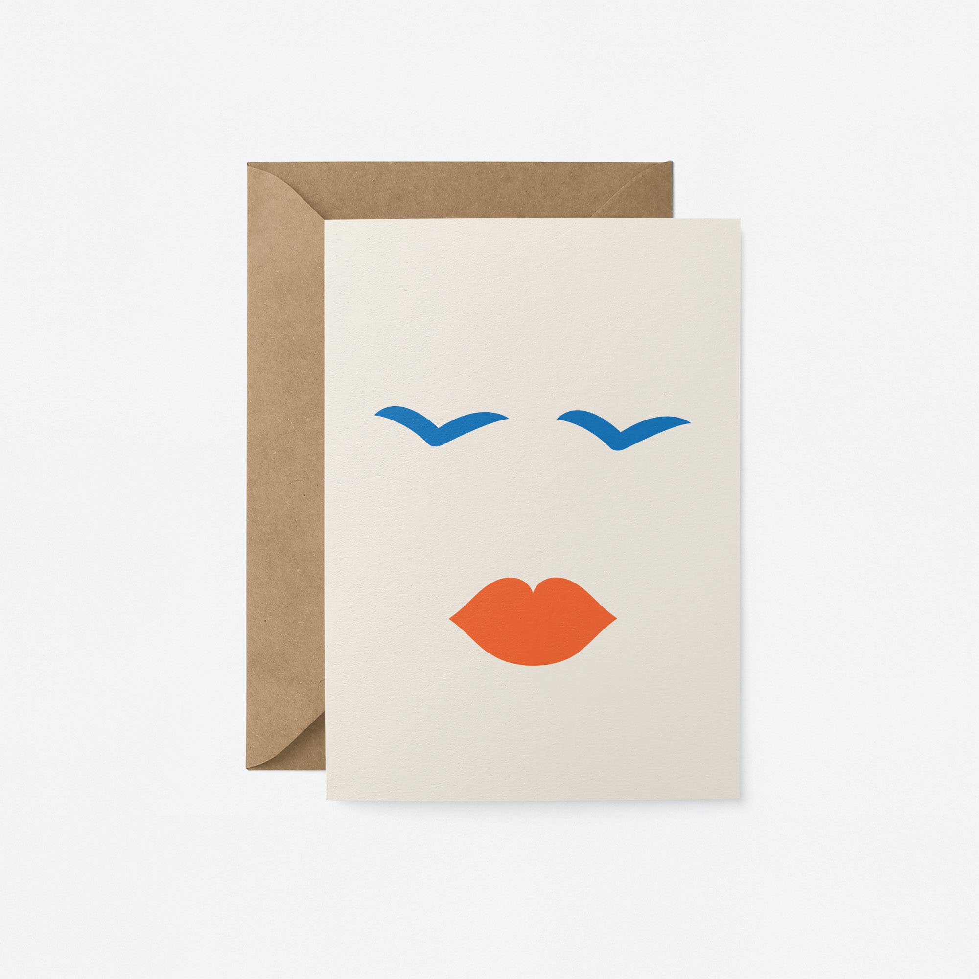 Love card with face shape, red lips, blue eyes