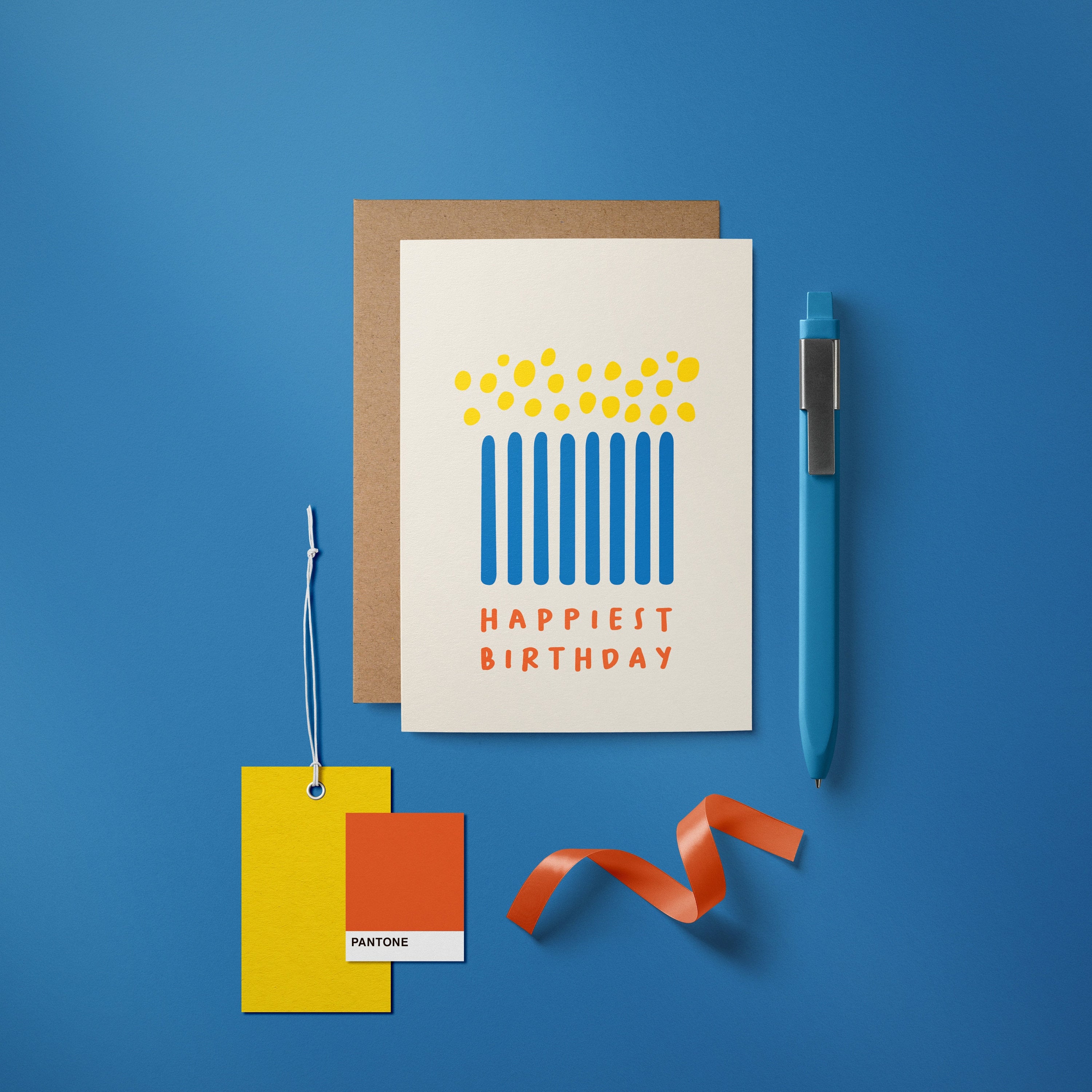 Birthday card with blue candle figures and yellow fire with a text that says Happiest Birthday