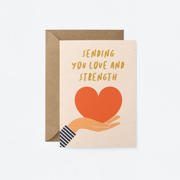Sympathy card with a hand holding a red heart and text that says sending you Love and strength