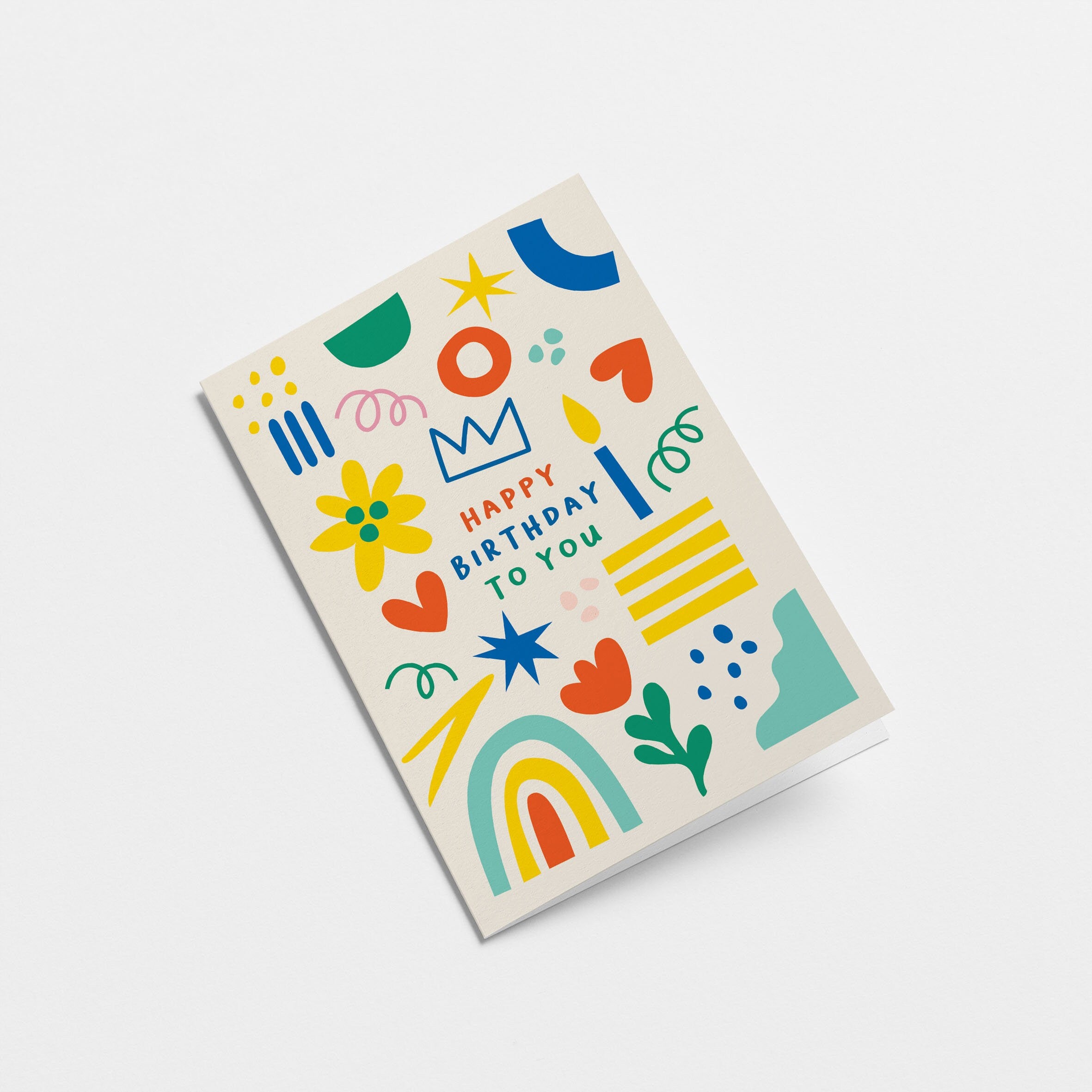 Birthday card with green, red, yellow, blue figures and a text that says happy birthday to you