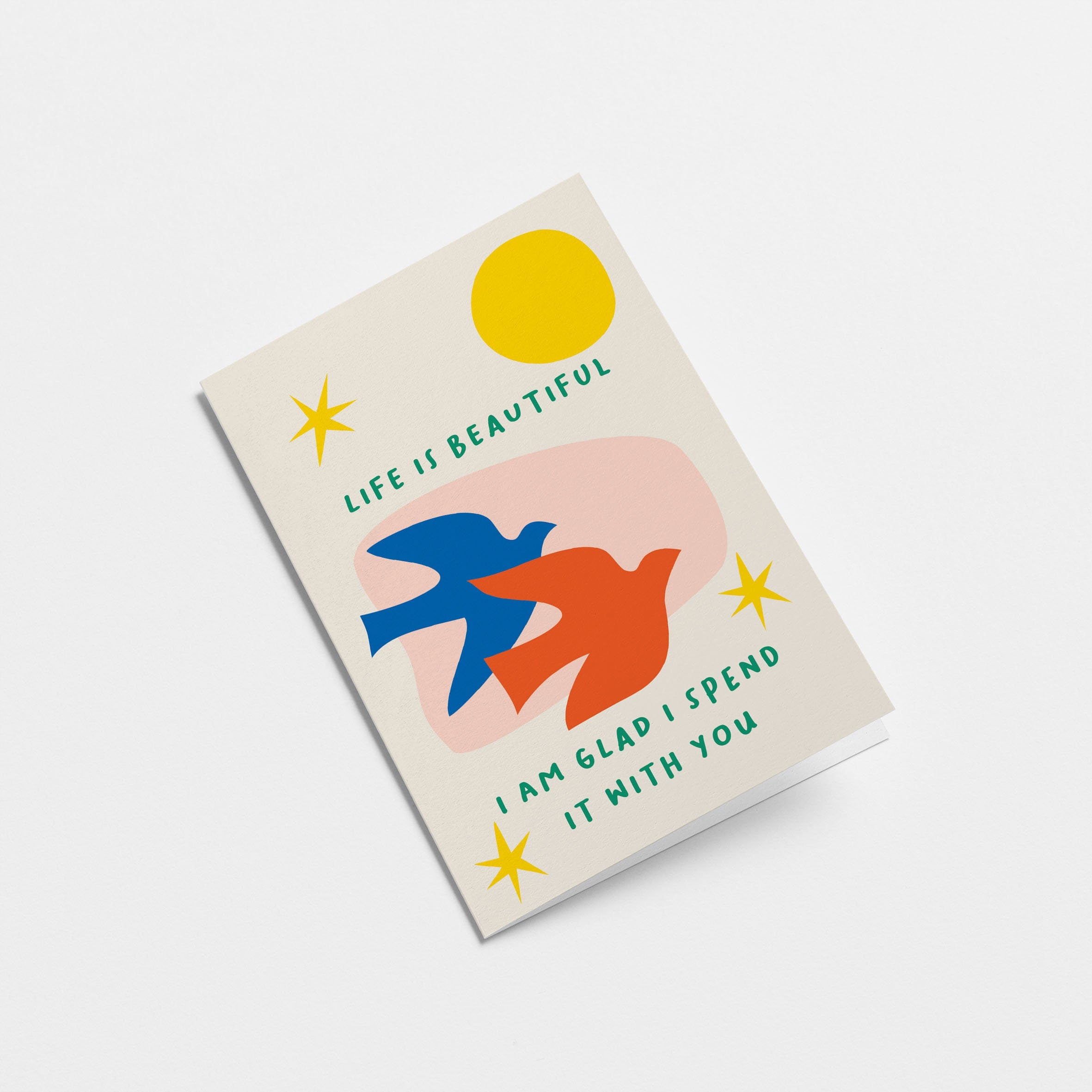 Love card with blue and red birds, yellow sun, yellow stars and a text that says Life is beautiful i am glad i spend it with you