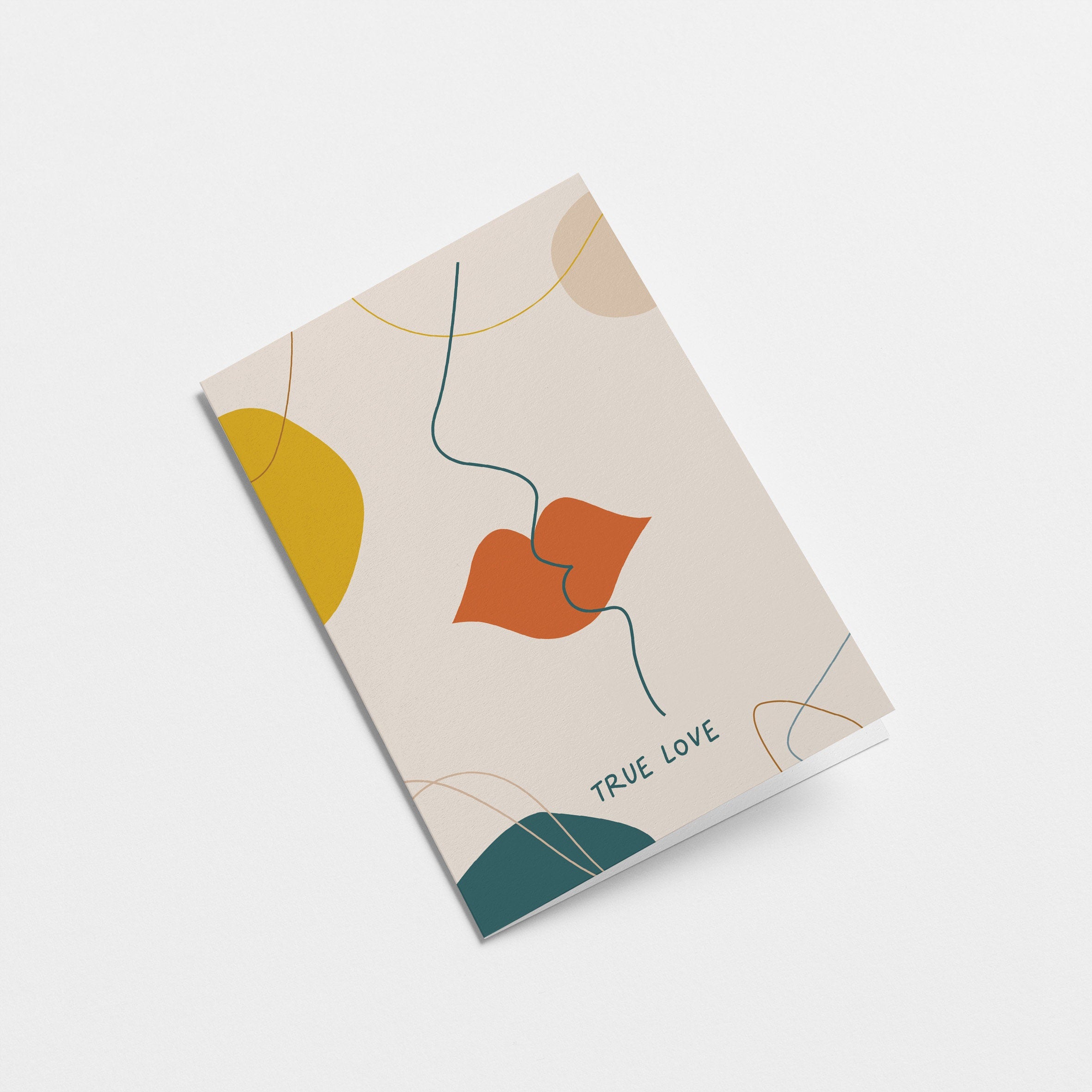 love card with 2 face drawings and red lips kissing with a text that says true Love