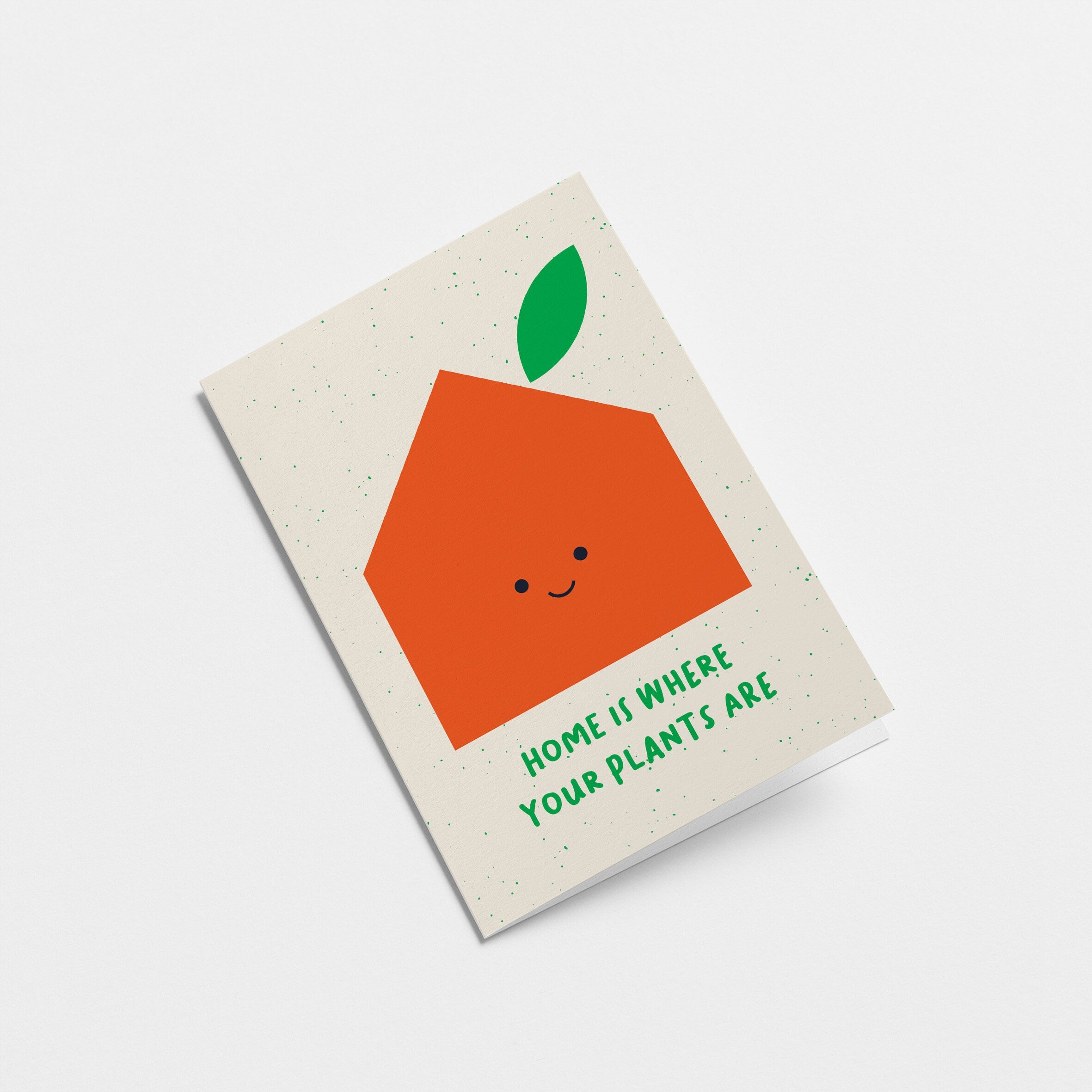 housewarming card with a yellow balloon with smiley face and a text that says never grow up