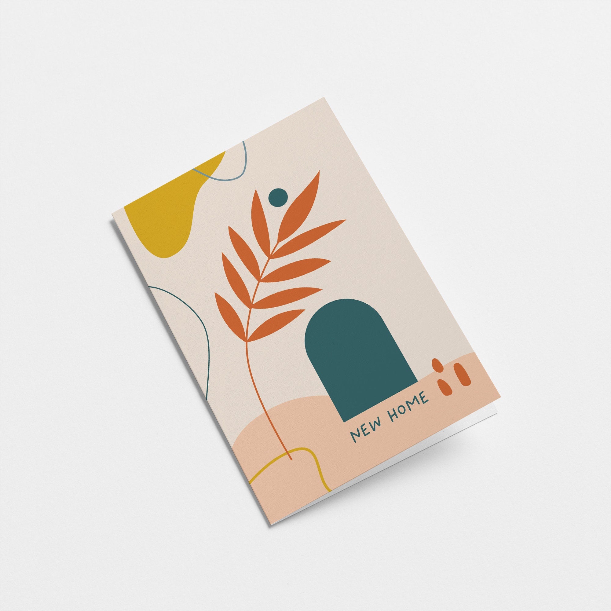 housewarming card with a red leaf drawing and a green door drawing and a text that says new home