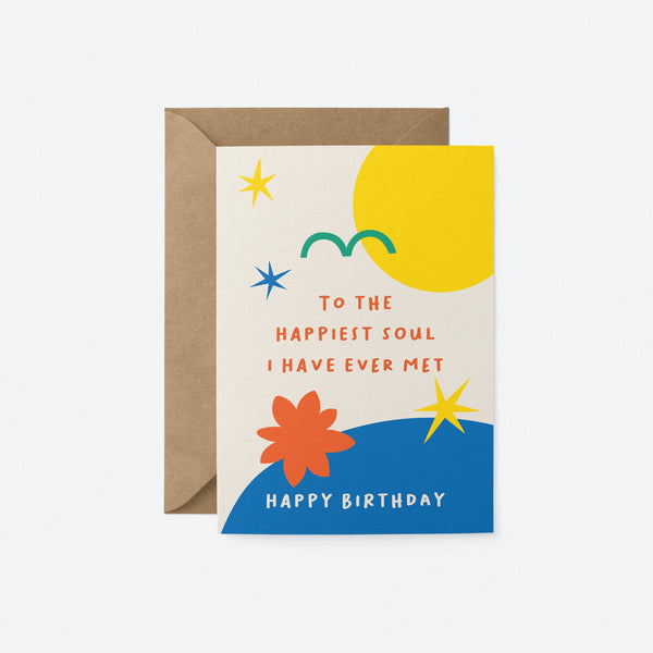 birthday card with yellow sun green bird yellow stars blue figures and a text that says to the happiest soul i have ever met happy birthday