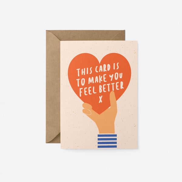 greeting card with a hand holding red heart and a text inside the heart that says this card is to make you feel better