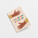 birthday card with two brown arms hugging with a text that says a big birthday hug for you