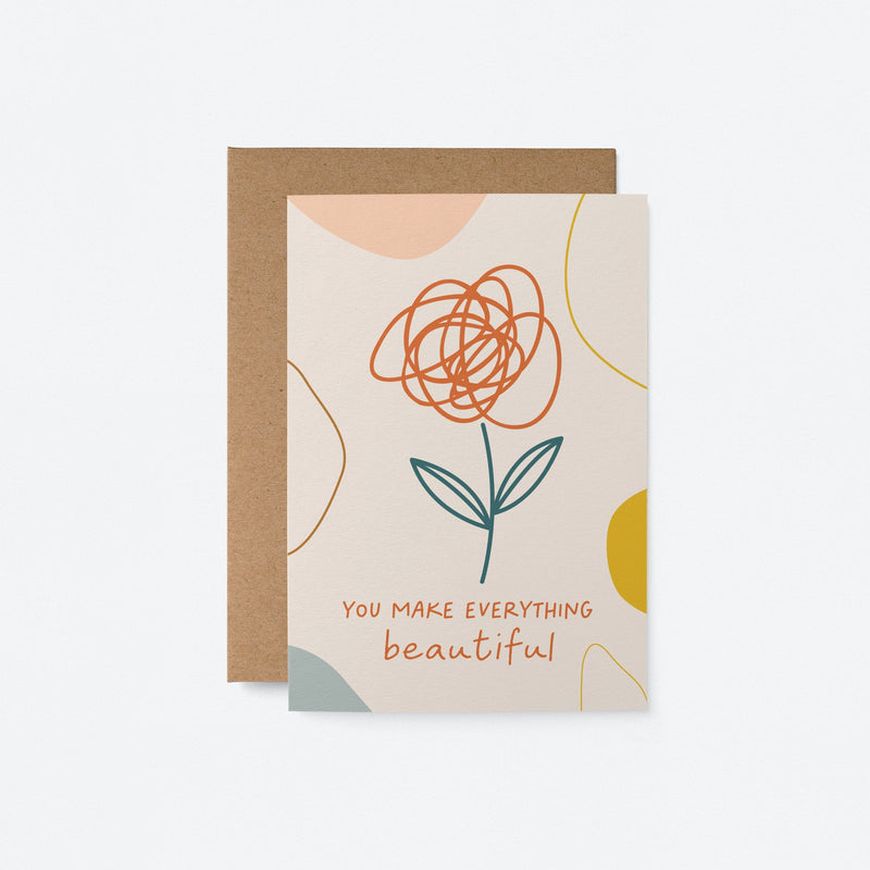 Love card with a flower drawing and a text that says you make everything beautiful 