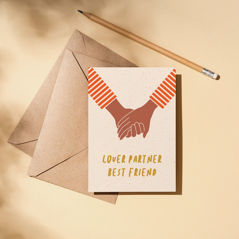 Love Card with 2 brown hands holding each other and a text that says lover partner best friend