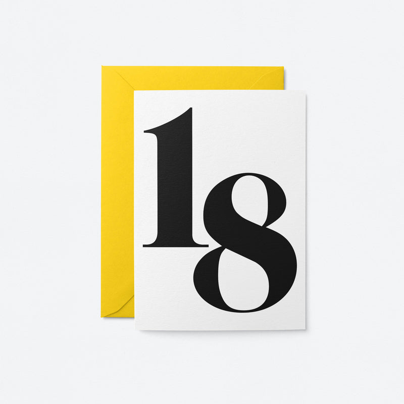 white 18th milestone age card with black number 18