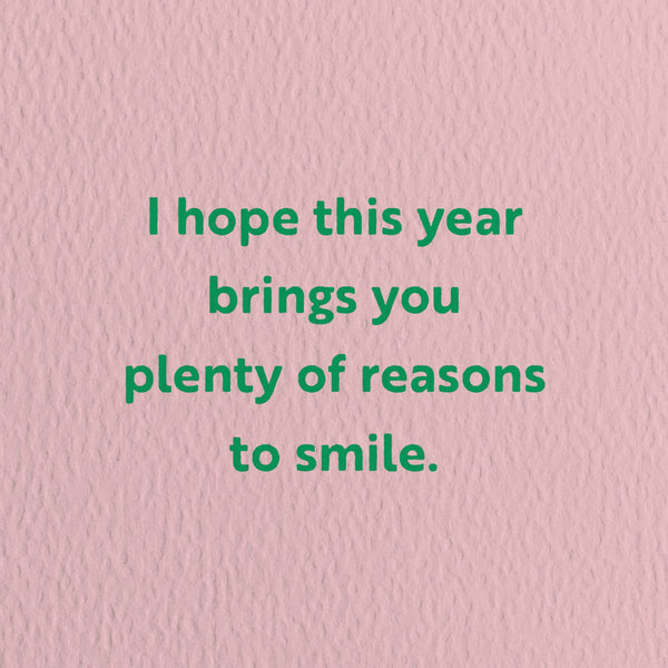 birthday card with a text that says I hope this year brings you plenty of reasons to smile