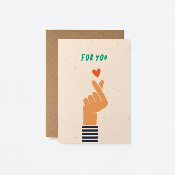 love and friendship card with a hand fingers crossed with a little red heart over it and a text that says for you