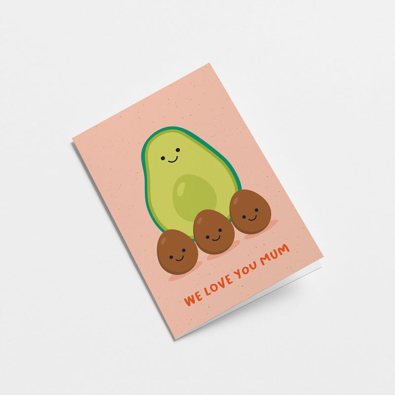 mother’s day card with a green avocado as a mother and three brown seeds as children and a text that says we love you mum