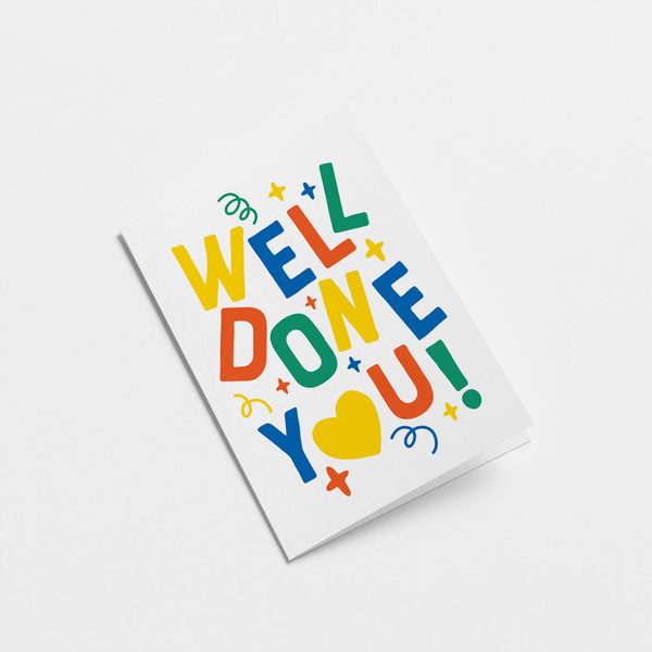 congratulations card with colorful letters and a text of well done you!