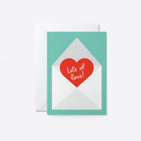 love card with a red heart shape in a white envelope with a text that says lots of love